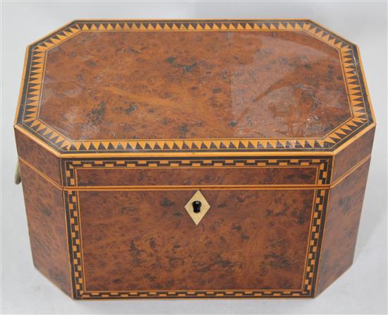 A Victorian birds eye yew elongated octagonal tea caddy, 8.5in.